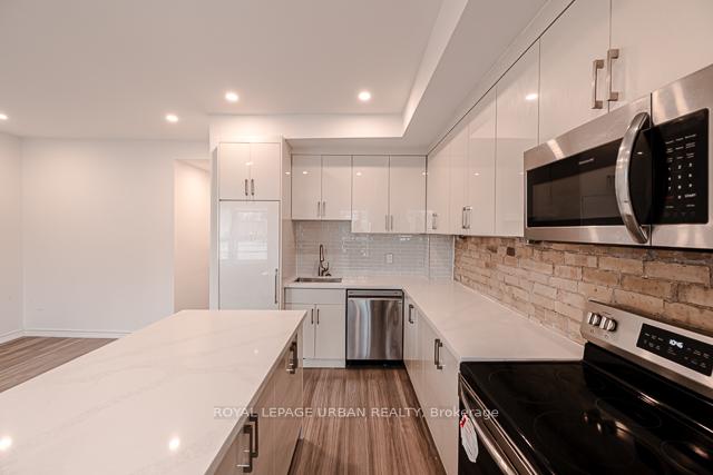 991 Queen Street E 3