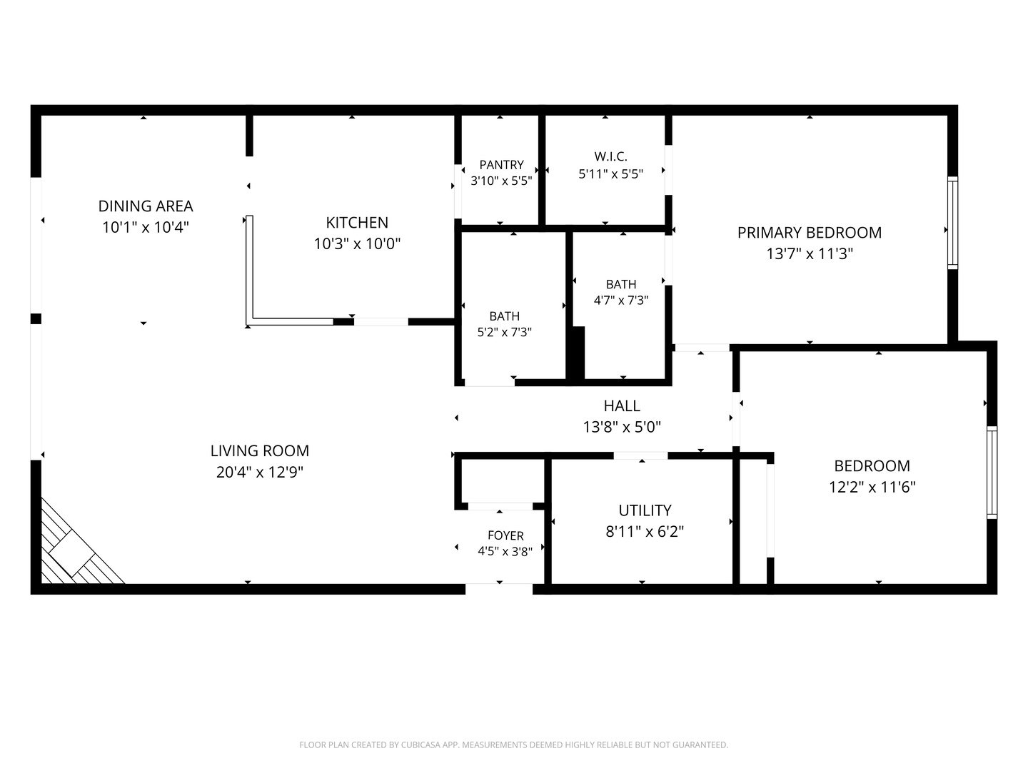 Floor plan showing two bedrooms, two bathrooms, living room, dining area, kitchen, and utility room.
