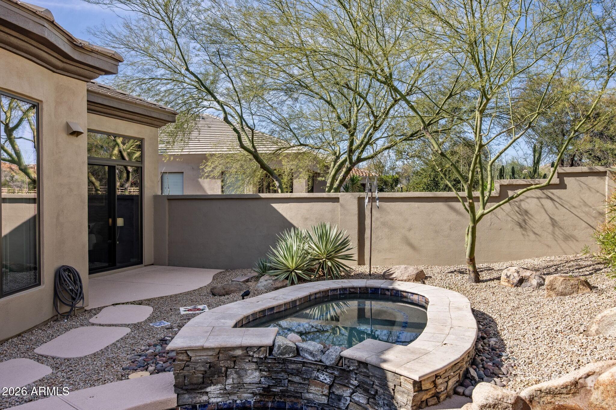 7692 E Whistling Wind Way