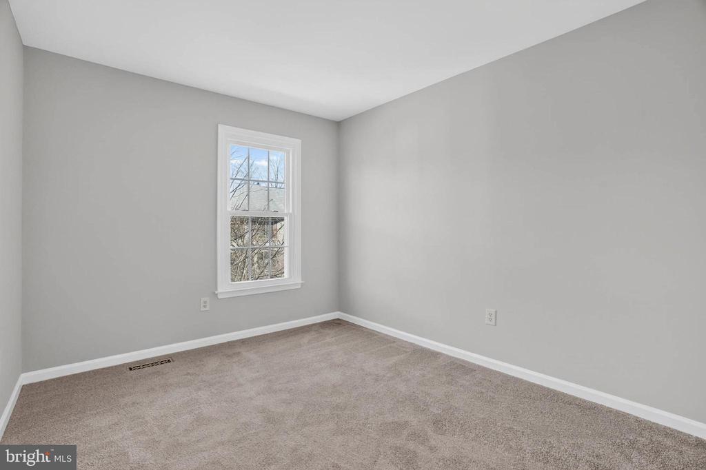 8608 WOODLAND MANOR DRIVE
