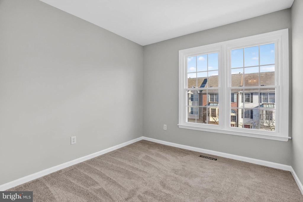 8608 WOODLAND MANOR DRIVE