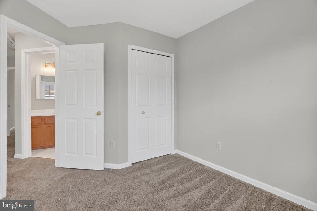 8608 WOODLAND MANOR DRIVE