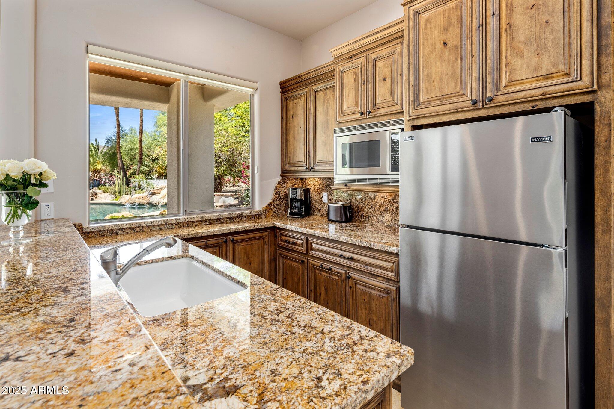 11717 E ESTRELLA Avenue