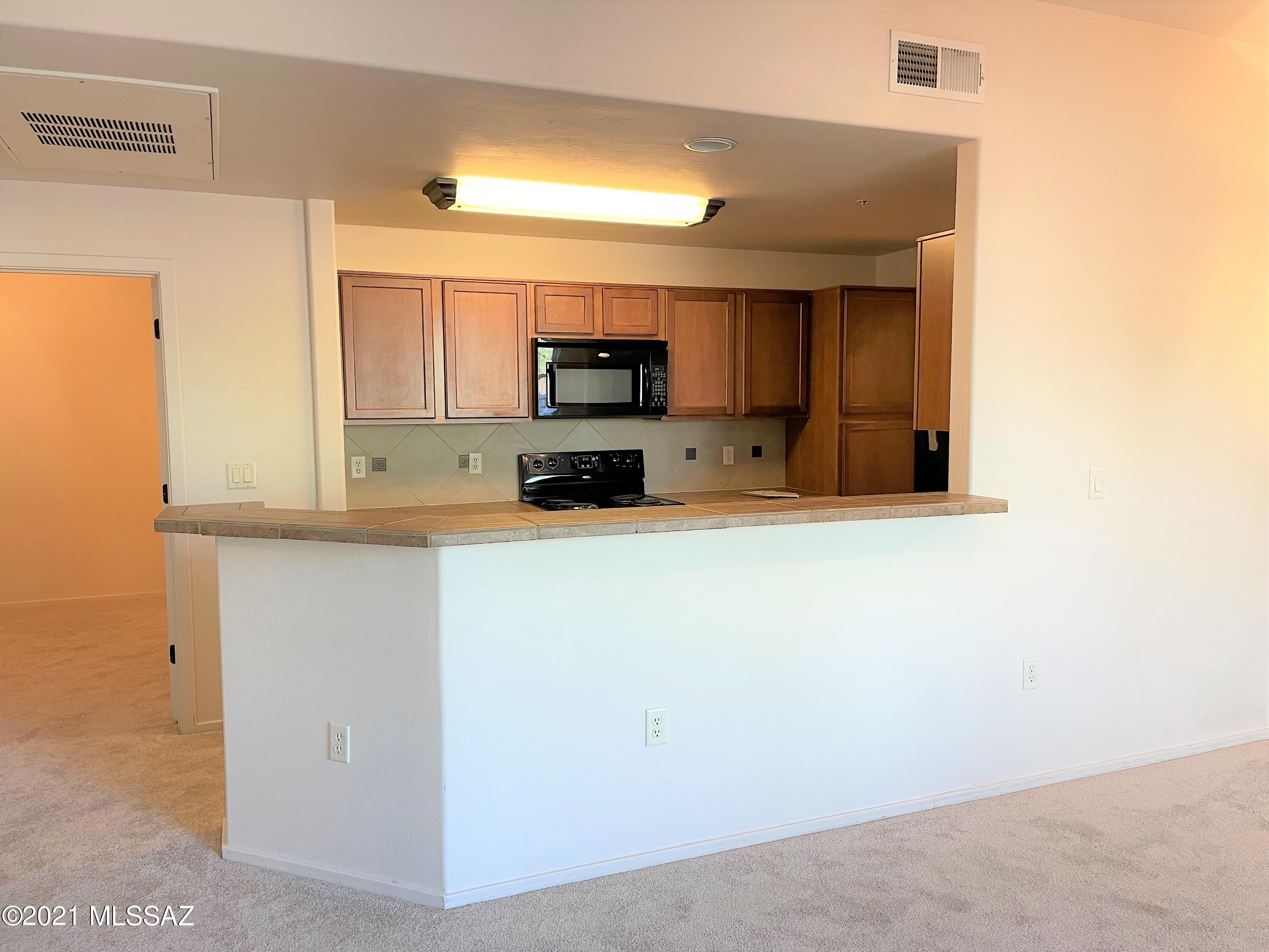 2024 E River Road Unit: 100