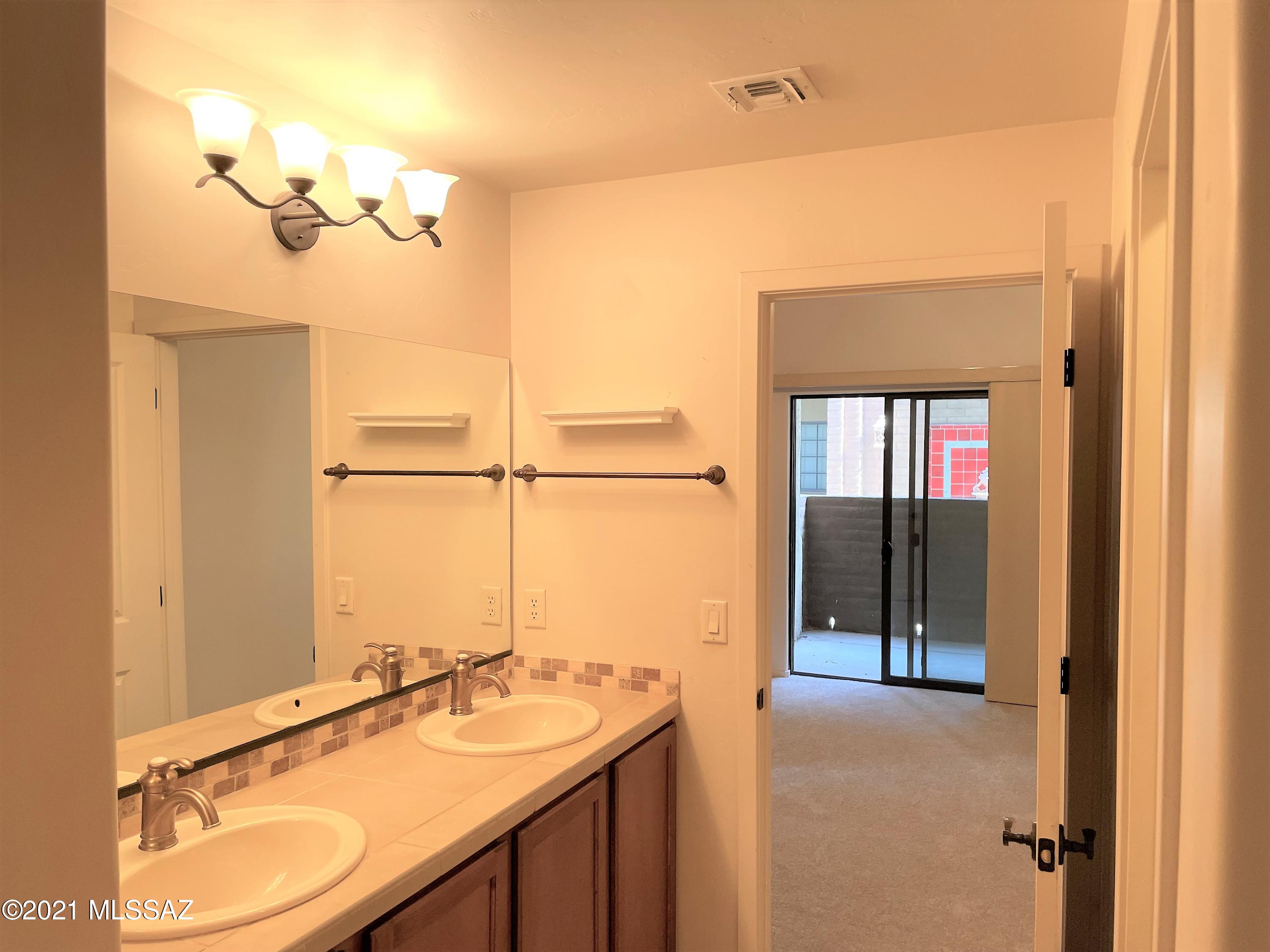 2024 E River Road Unit: 100