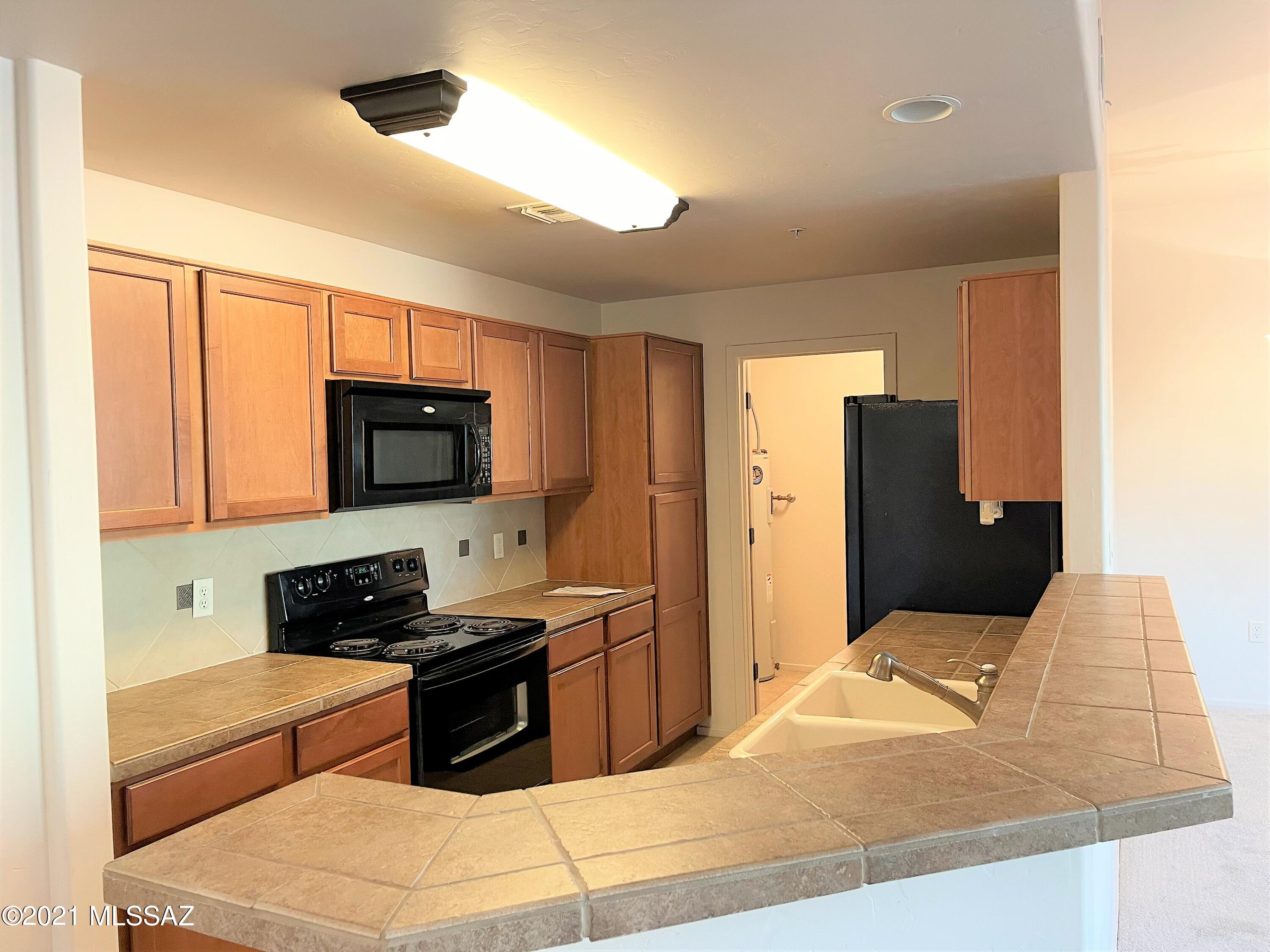 2024 E River Road Unit: 100