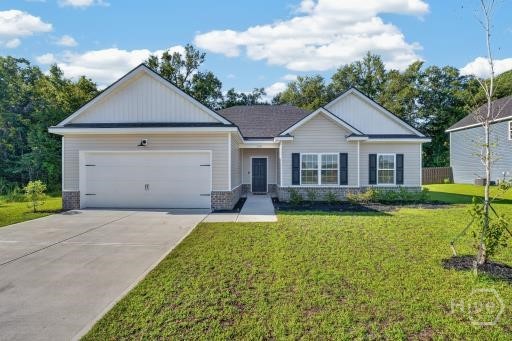 Single-story house with a two-car garage, dark shutters, and a broad green front lawn.