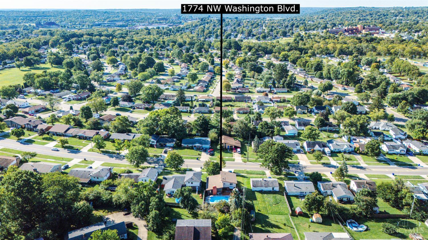 Aerial view of a leafy residential neighborhood labeled 1774 NW Washington Boulevard.