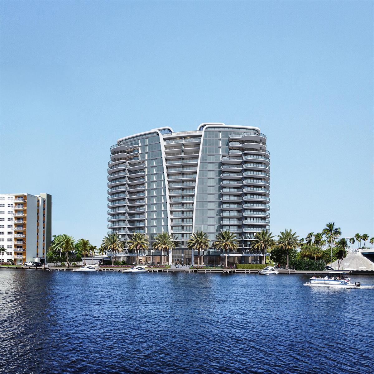 Modern waterfront condominium tower with curved balconies, palm-lined shore, and boats on the water.