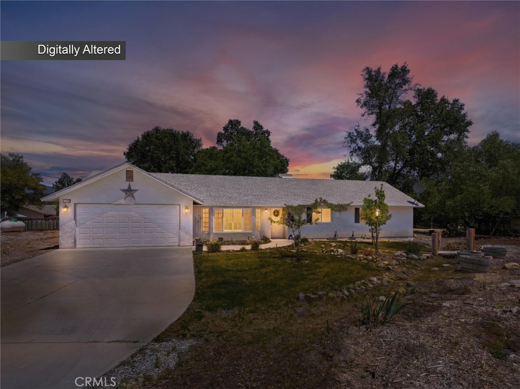 Single-story home with a two-car garage and curved driveway beneath a digitally altered sunset sky.