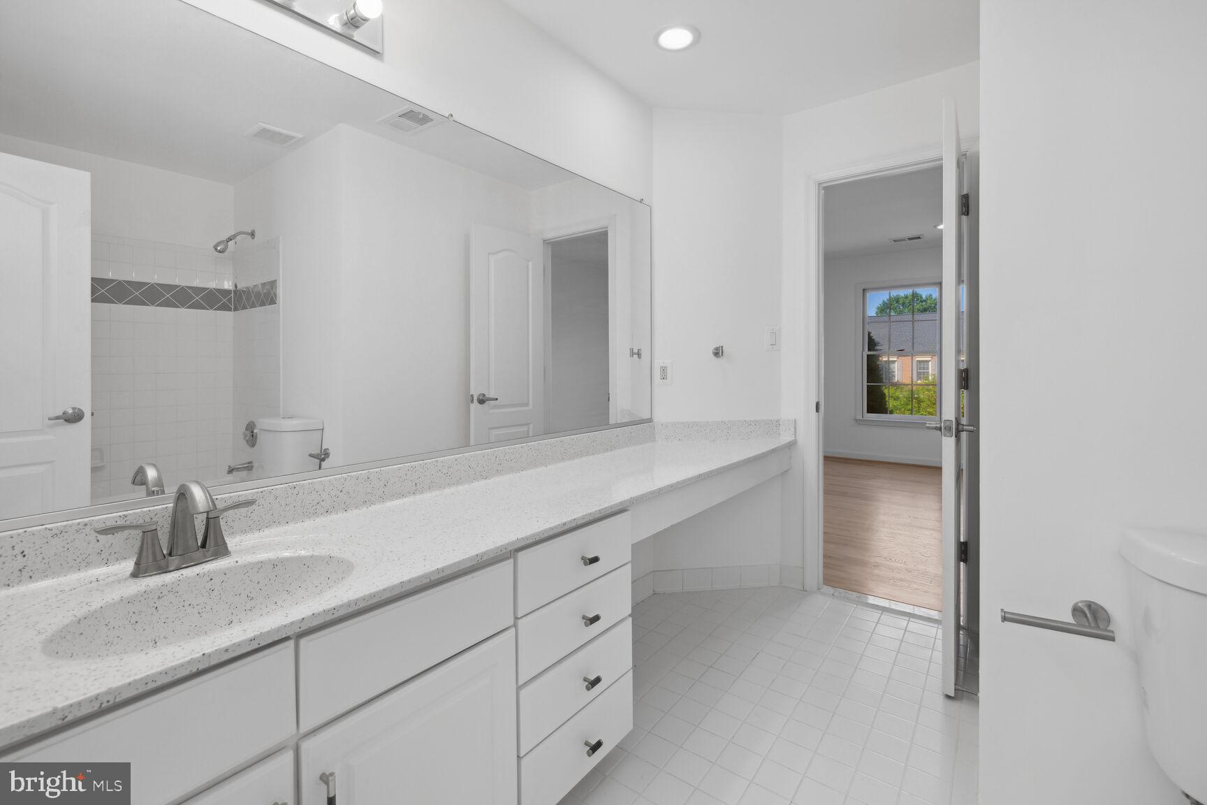 9909 BALD CYPRESS DRIVE