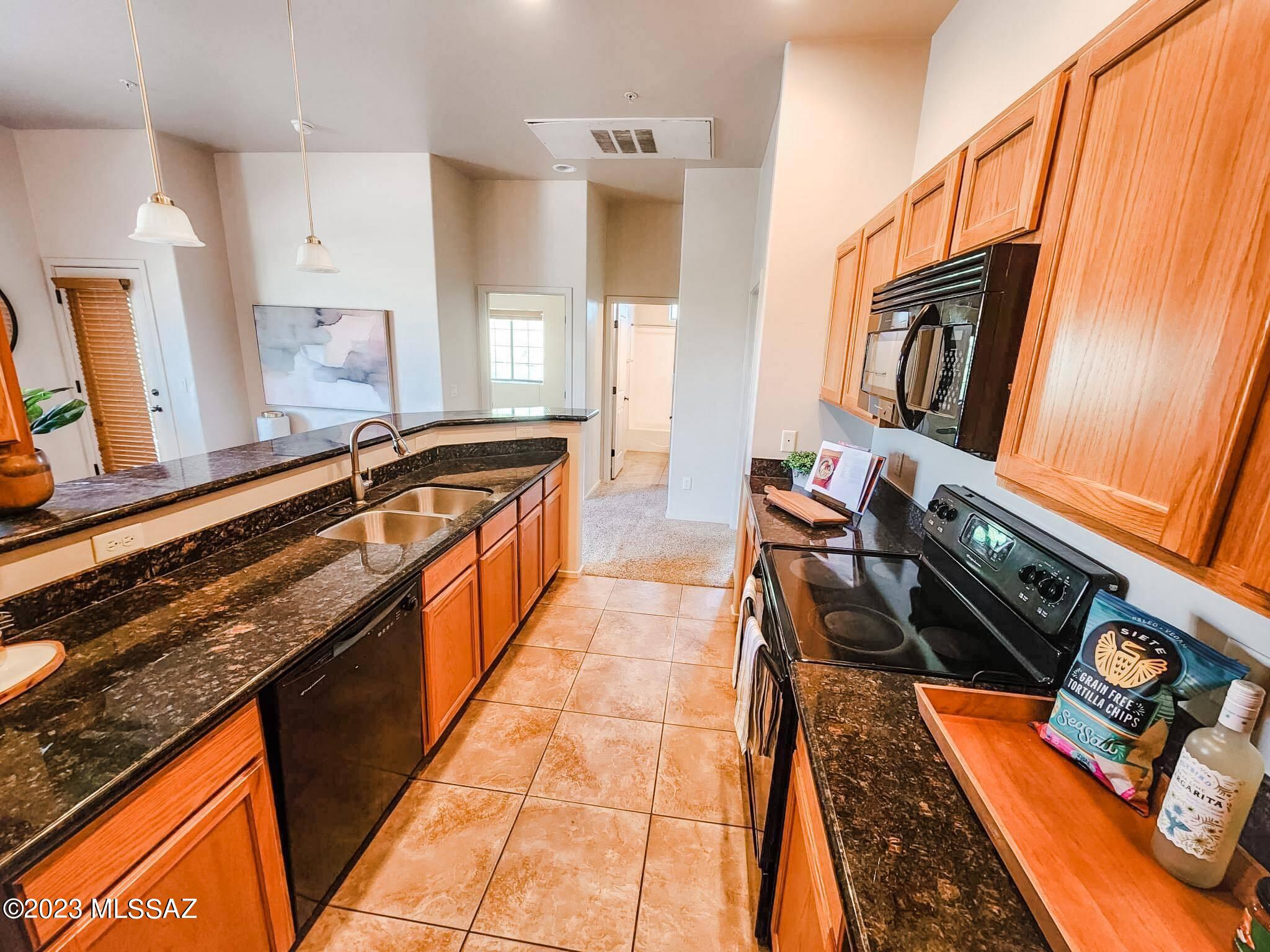 2026 E River Rd Unit: 203