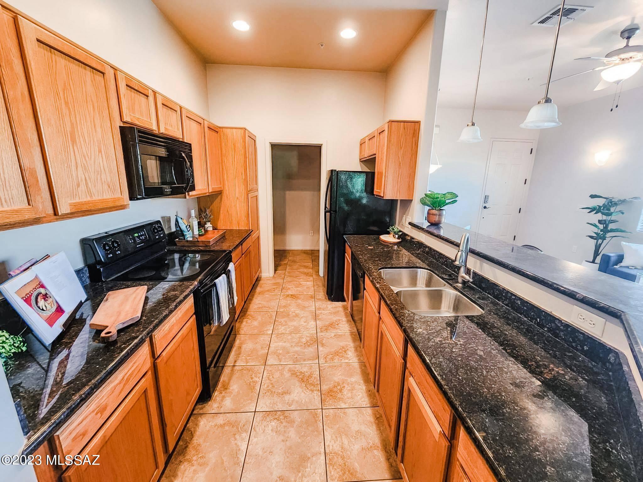 2026 E River Rd Unit: 203