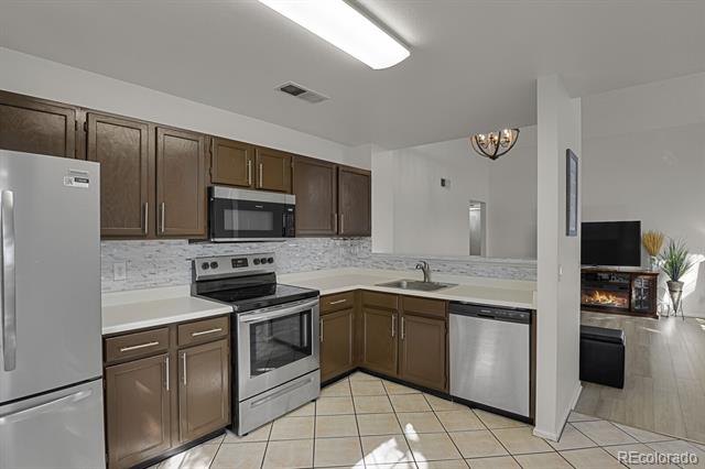 5702 W Asbury Place Unit: 302