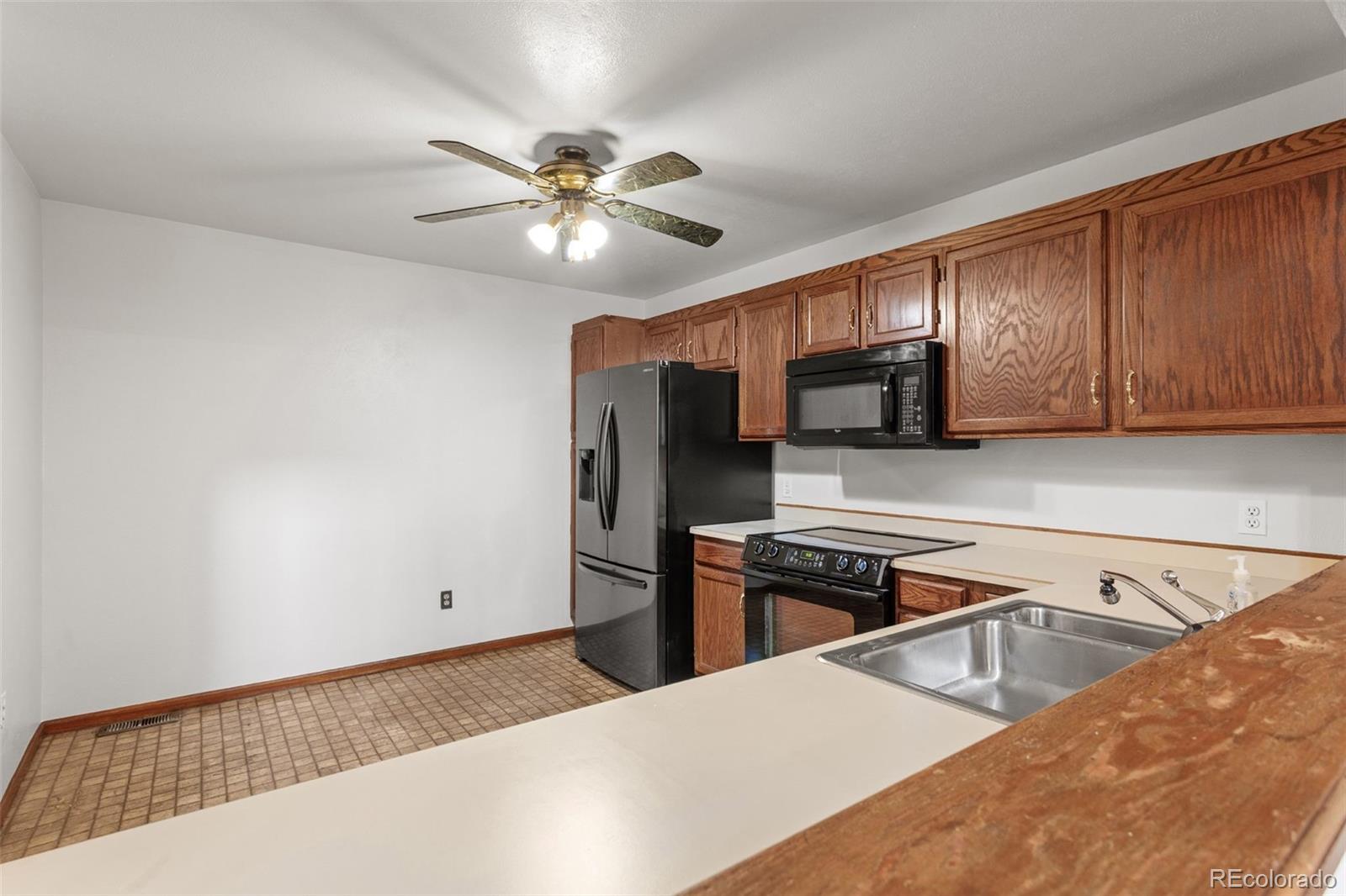 11765 W 66th Place Unit: B