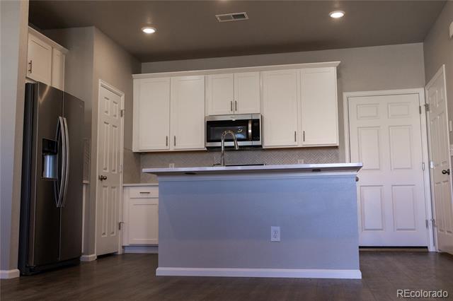 21201 E 63rd Drive