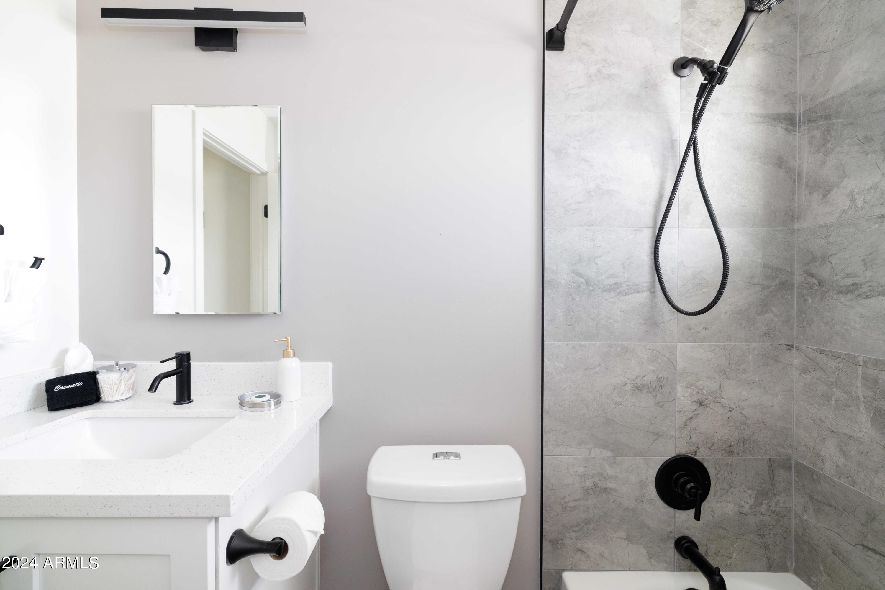 7025 E BELLEVIEW Street