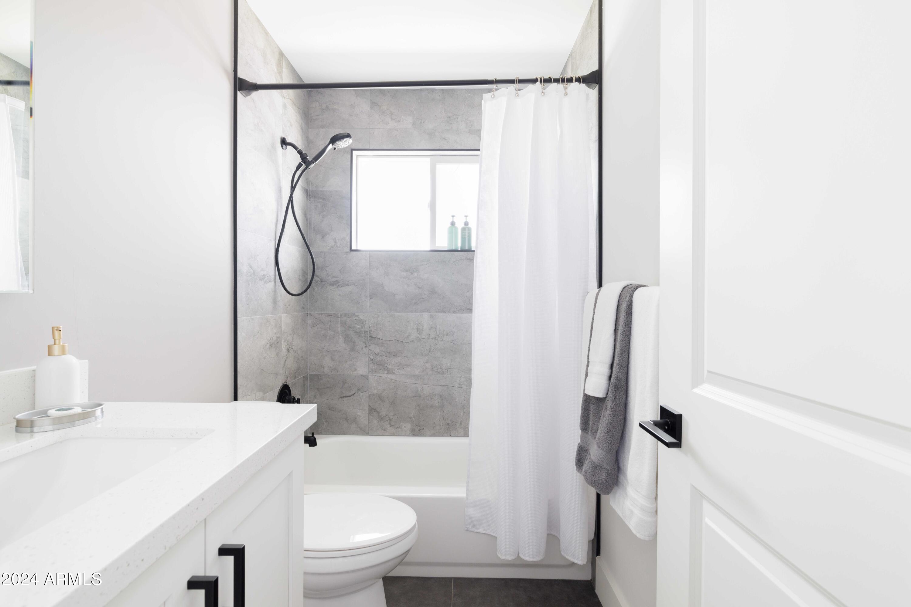 7025 E BELLEVIEW Street