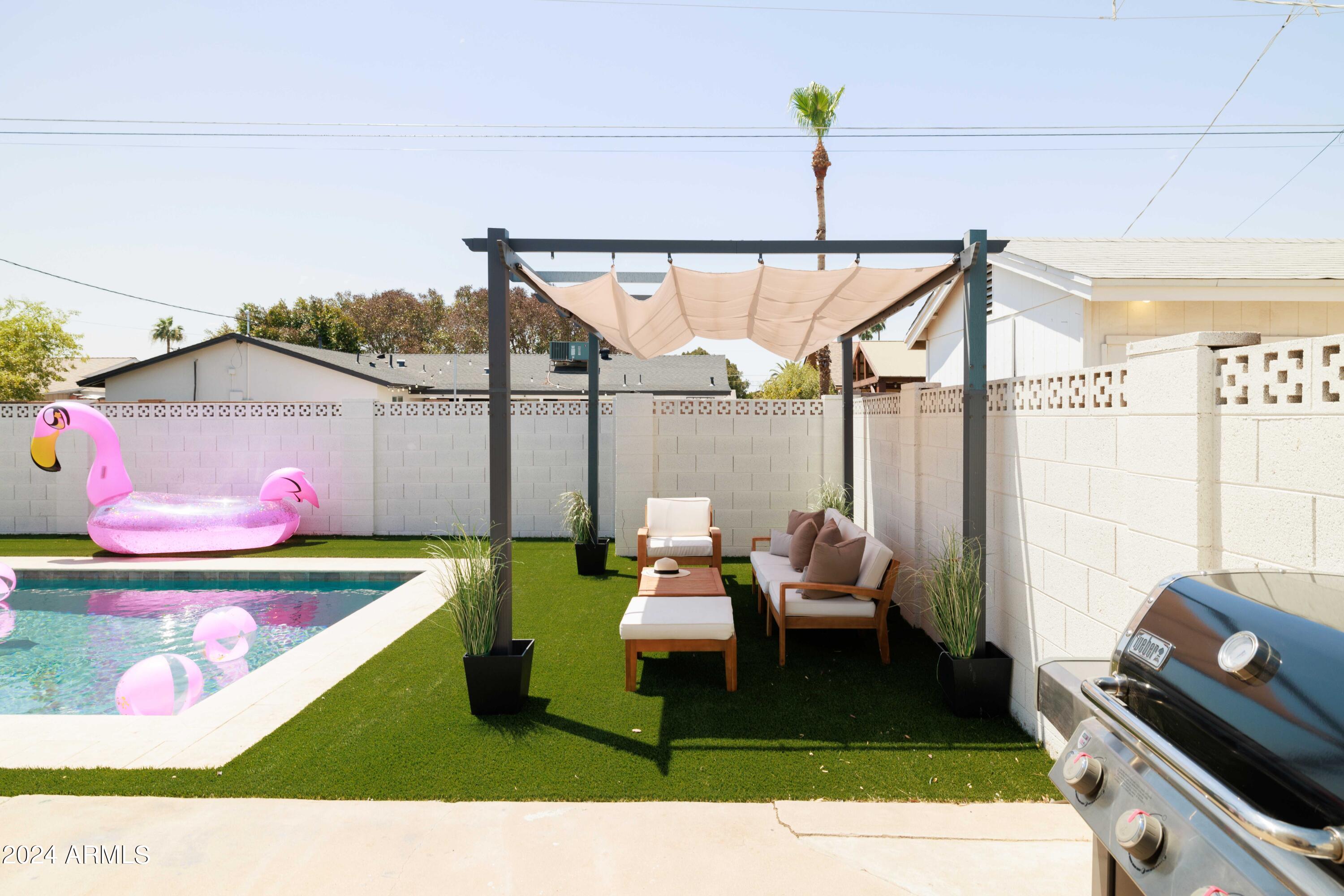 7025 E BELLEVIEW Street