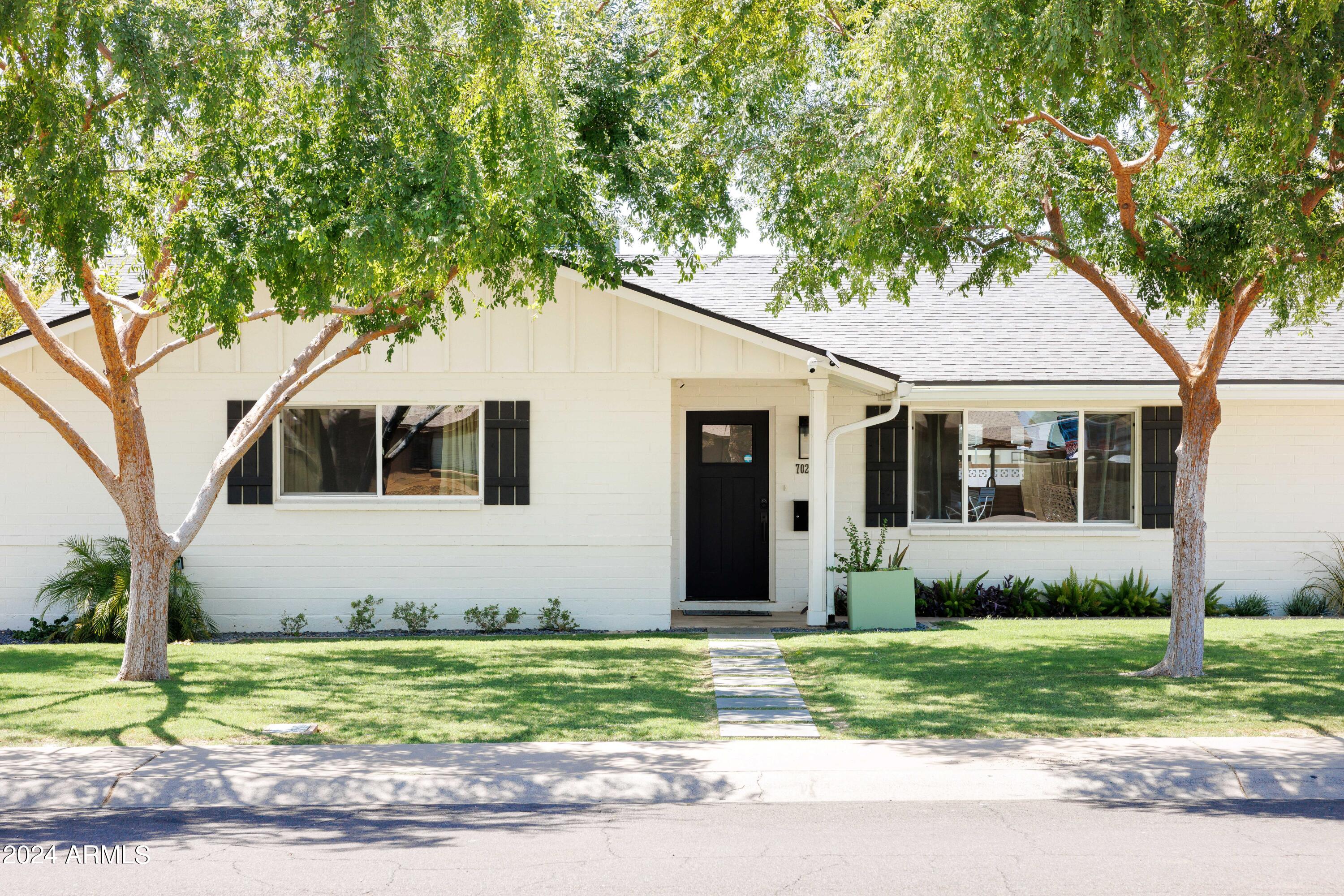 7025 E BELLEVIEW Street