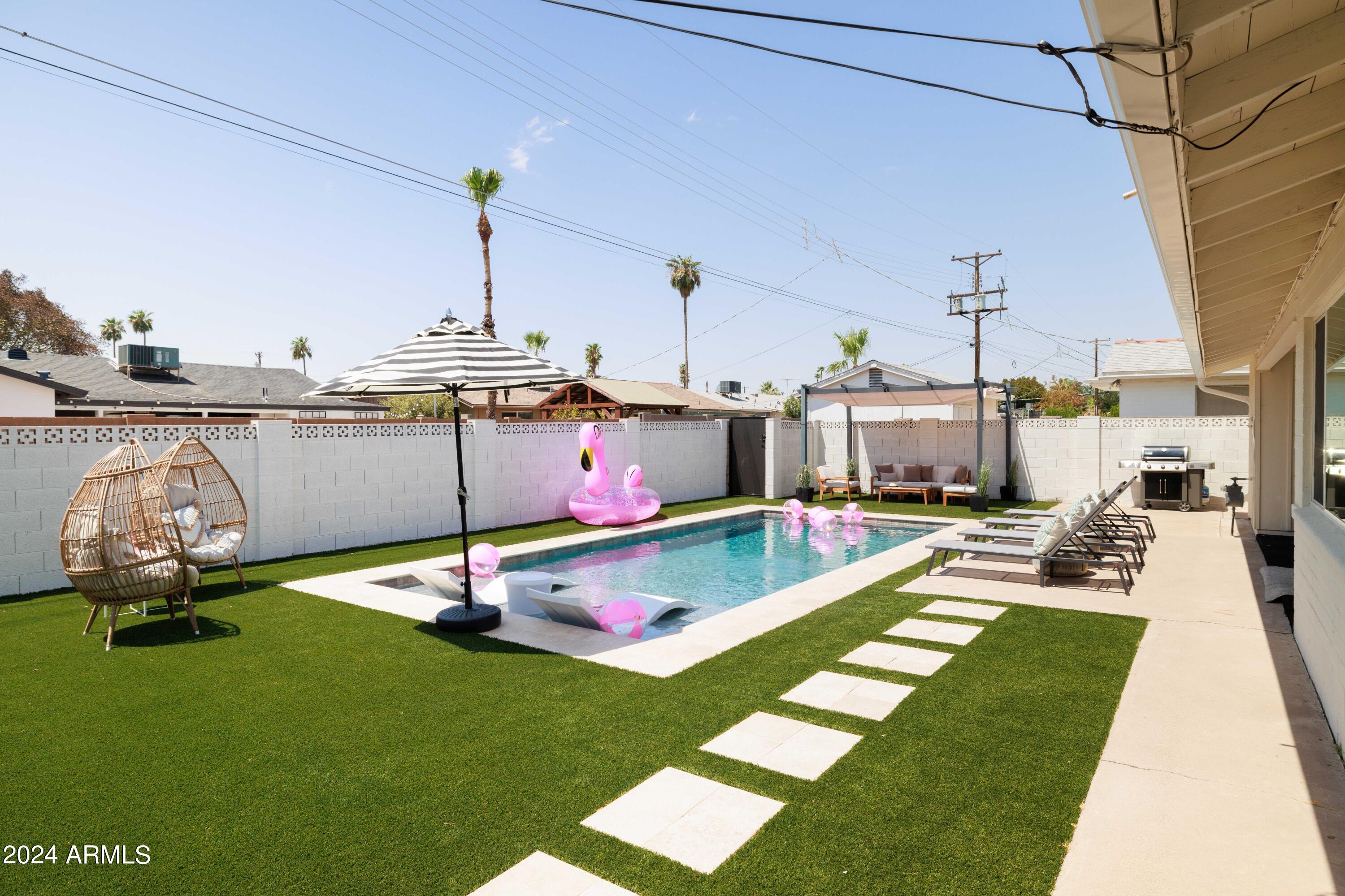 7025 E BELLEVIEW Street