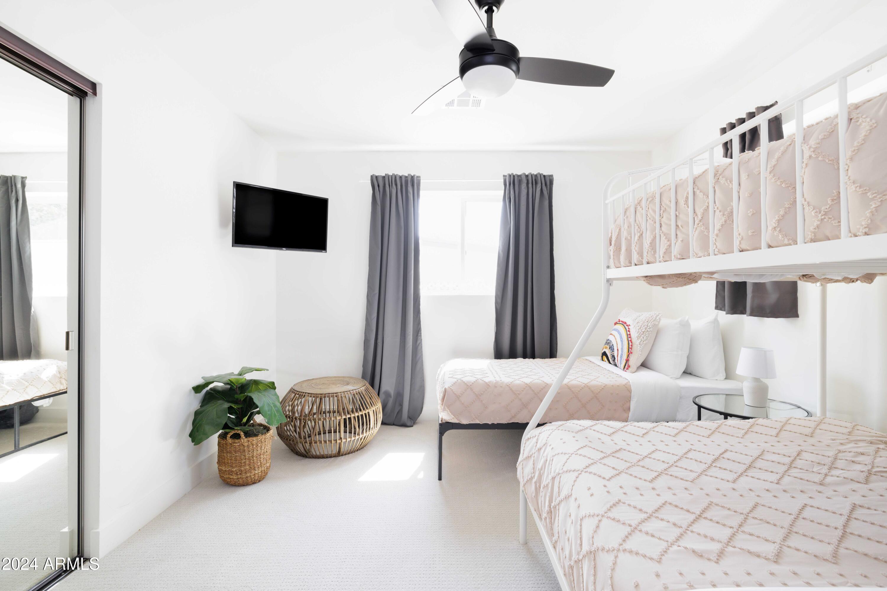 7025 E BELLEVIEW Street