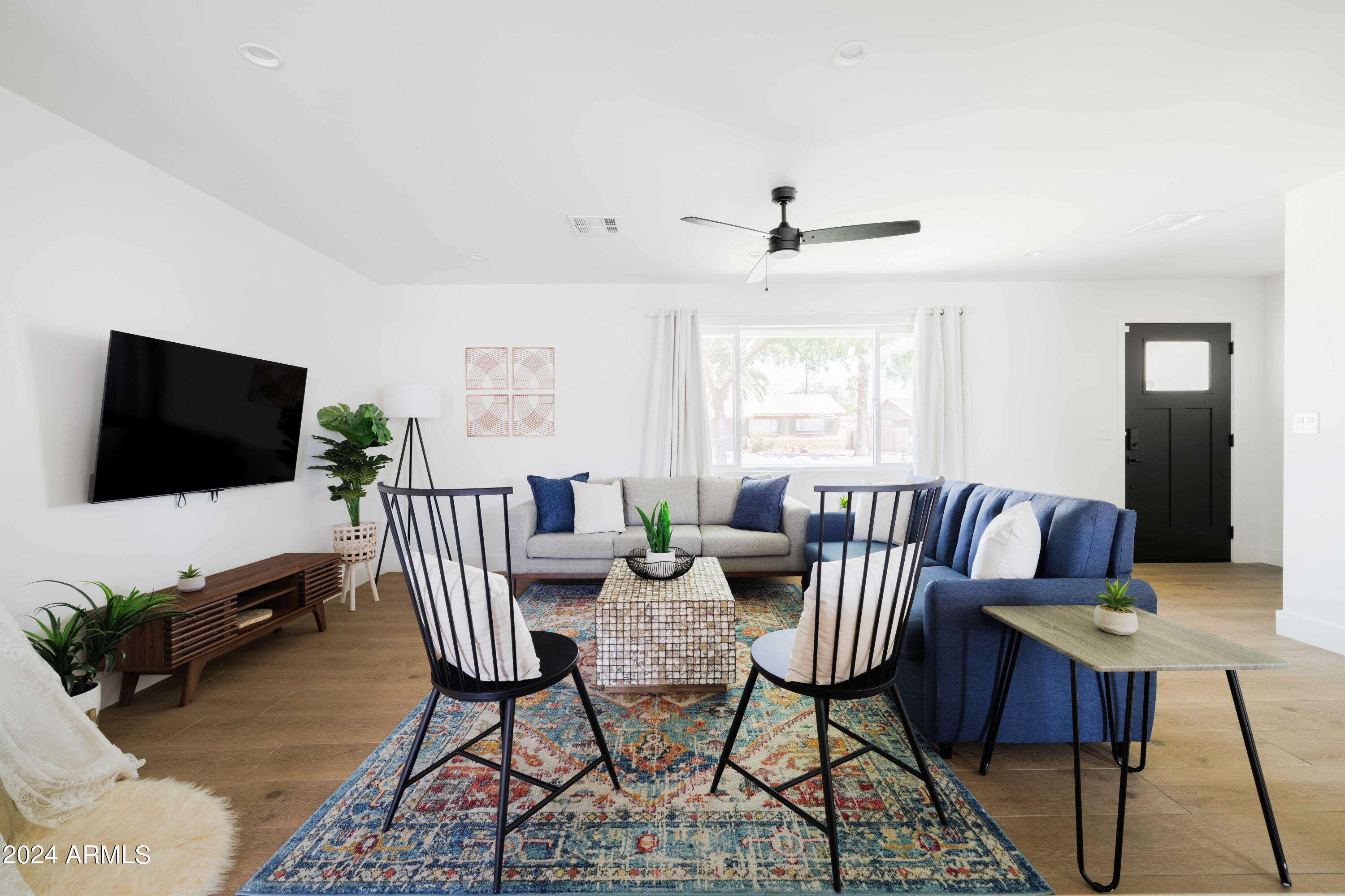 7025 E BELLEVIEW Street