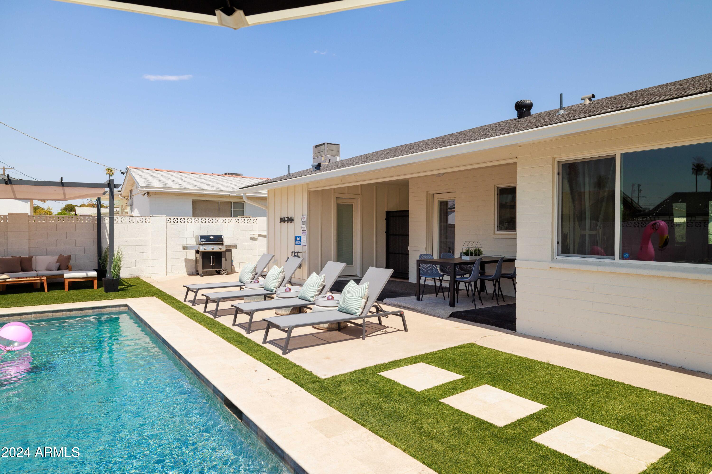 7025 E BELLEVIEW Street