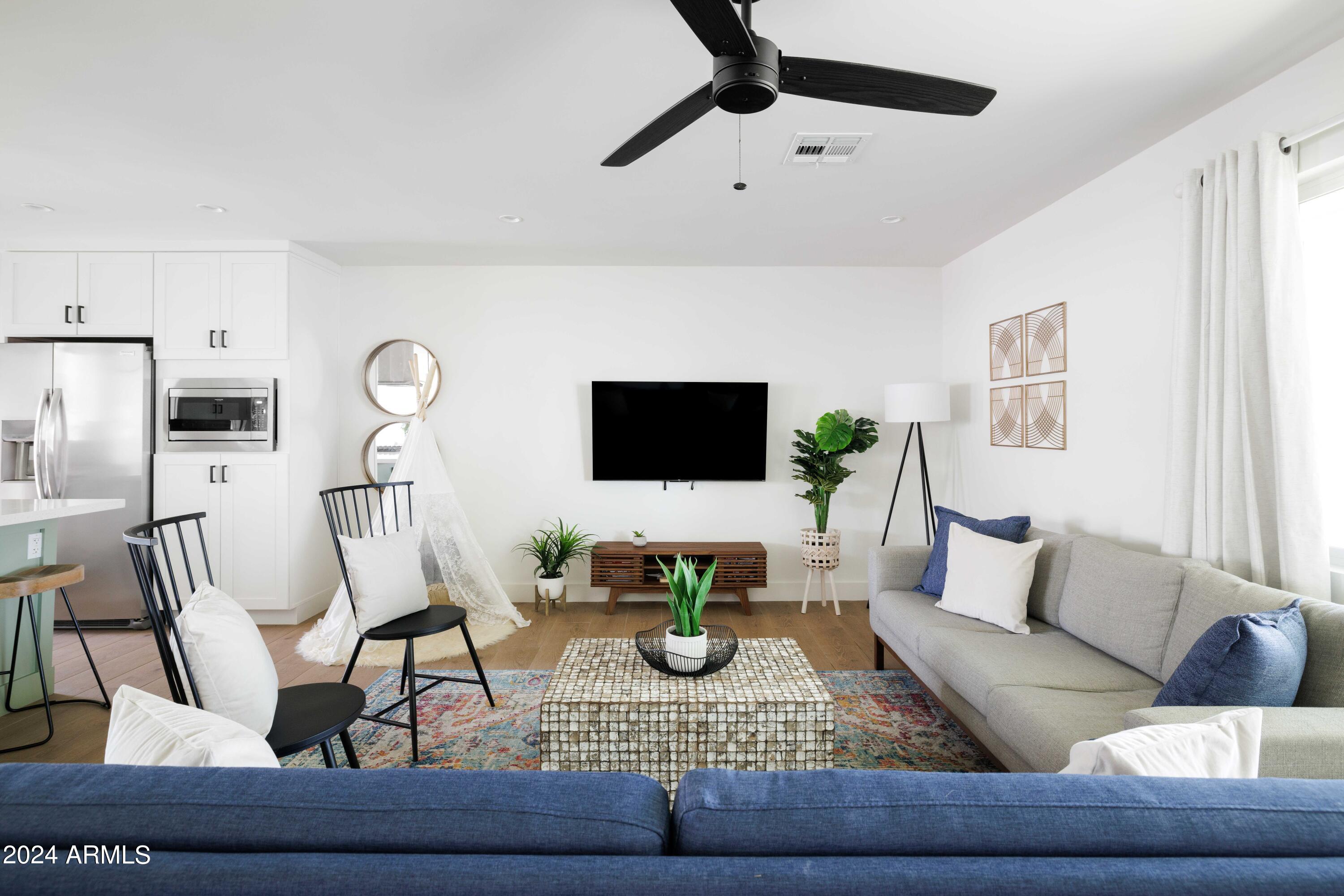 7025 E BELLEVIEW Street