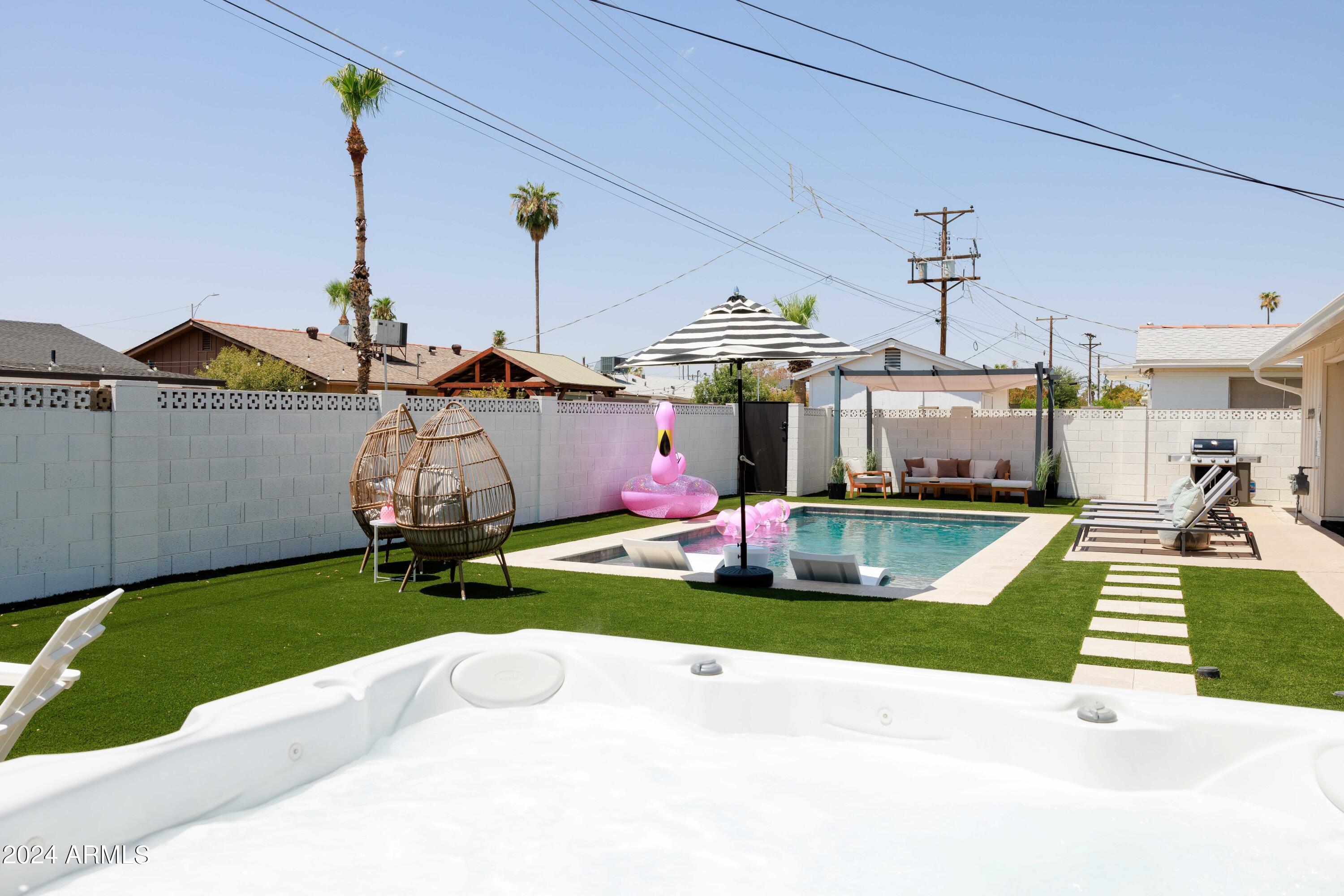 7025 E BELLEVIEW Street