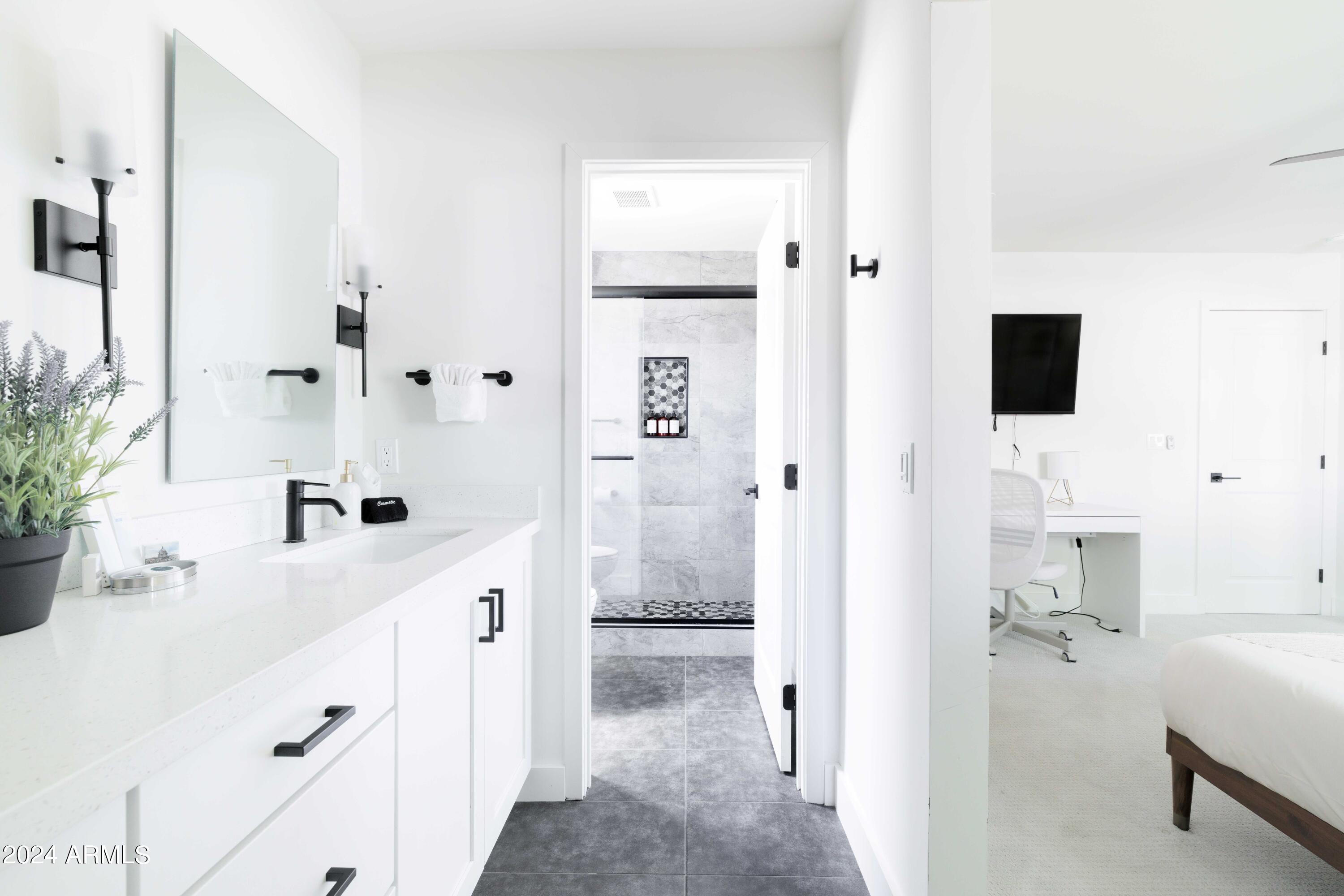 7025 E BELLEVIEW Street