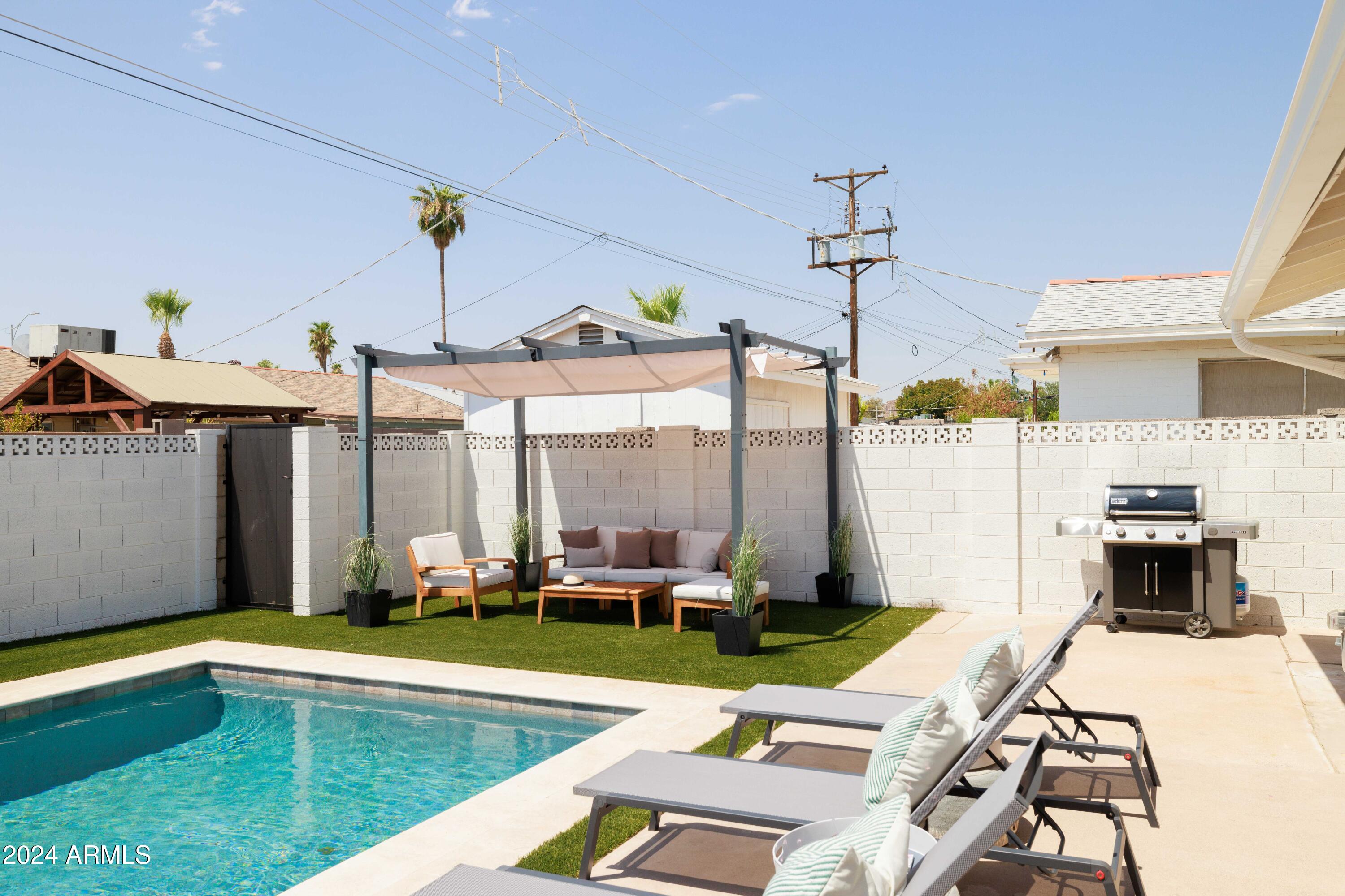 7025 E BELLEVIEW Street