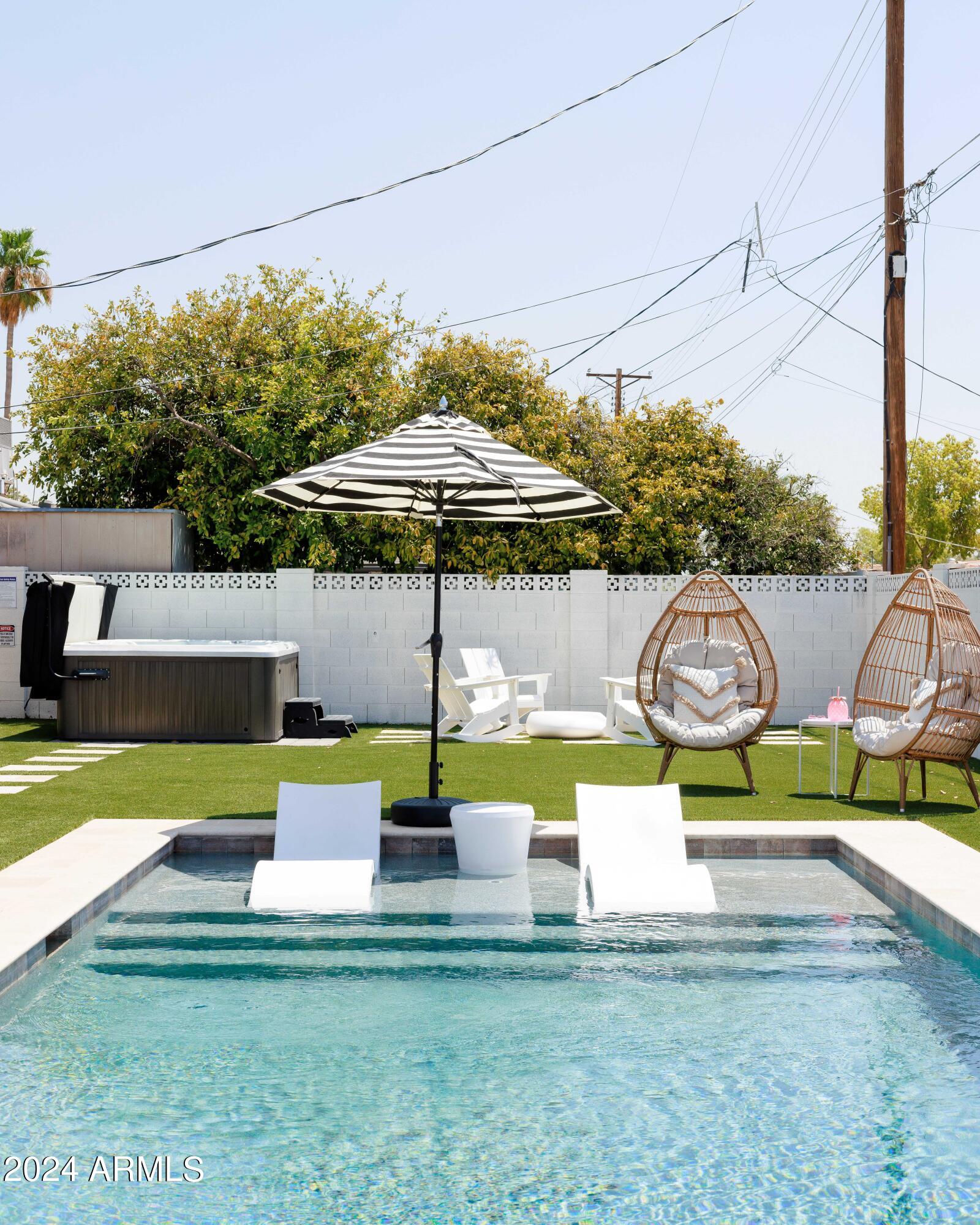 7025 E BELLEVIEW Street