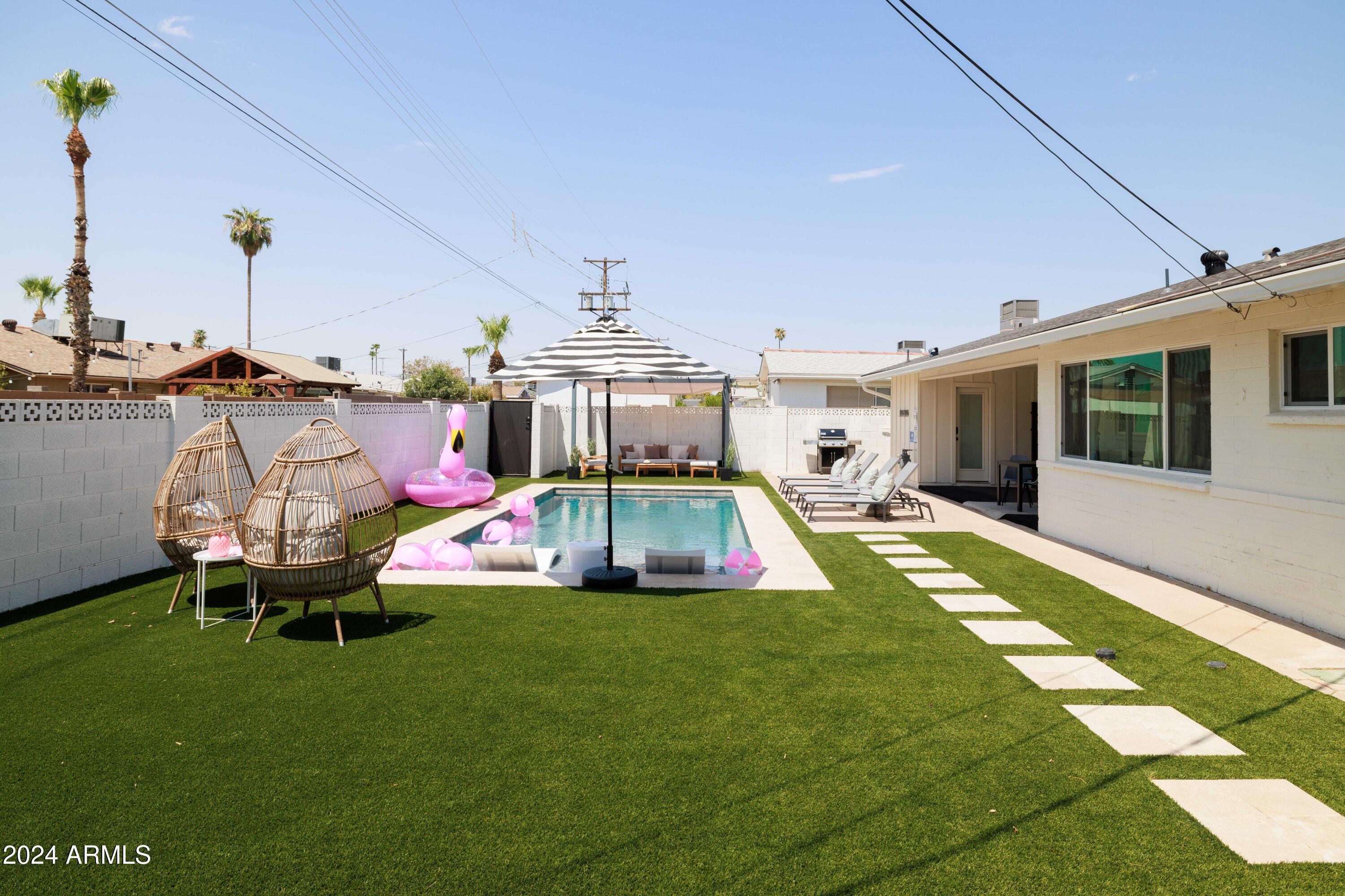 7025 E BELLEVIEW Street