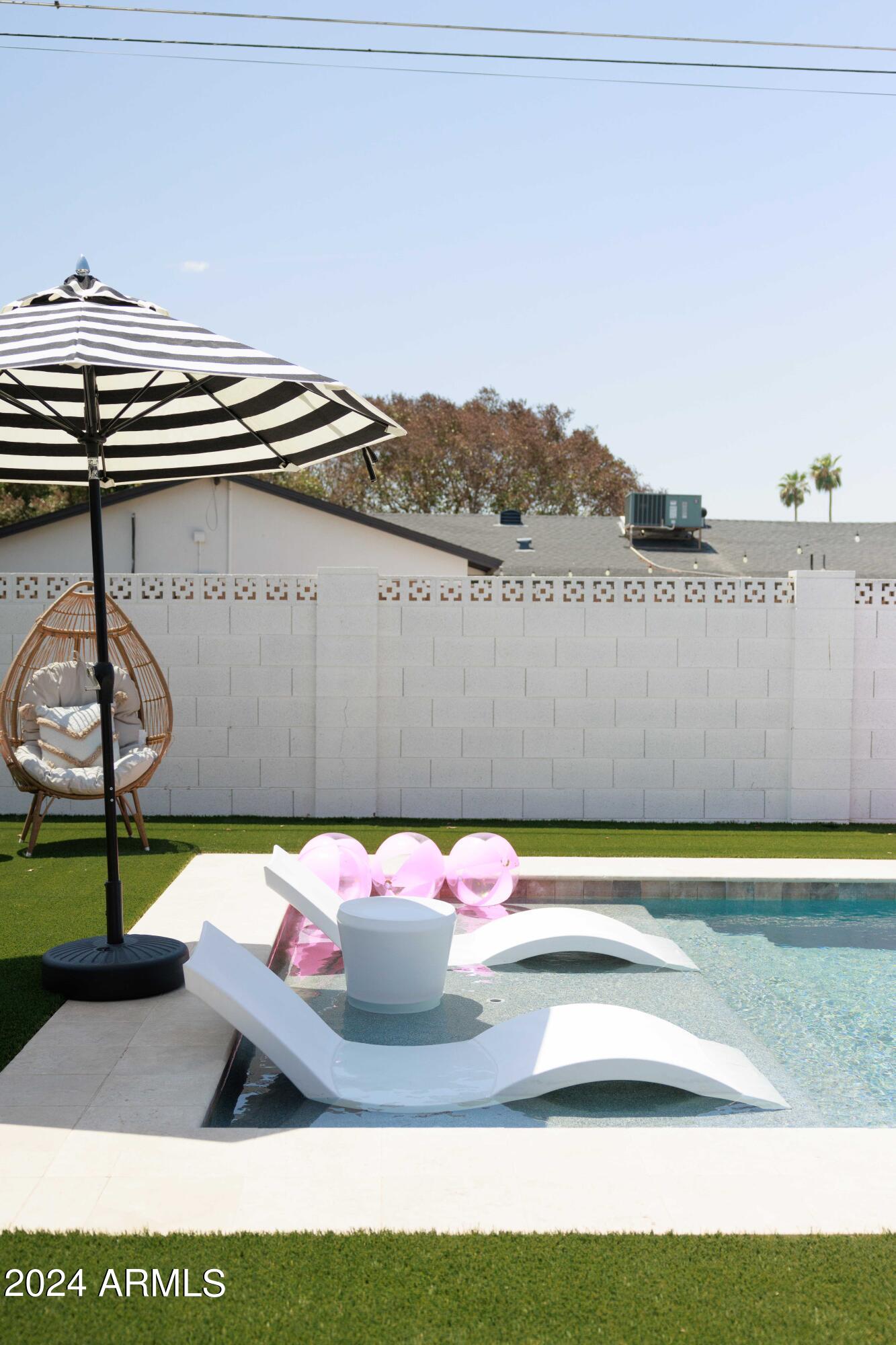 7025 E BELLEVIEW Street