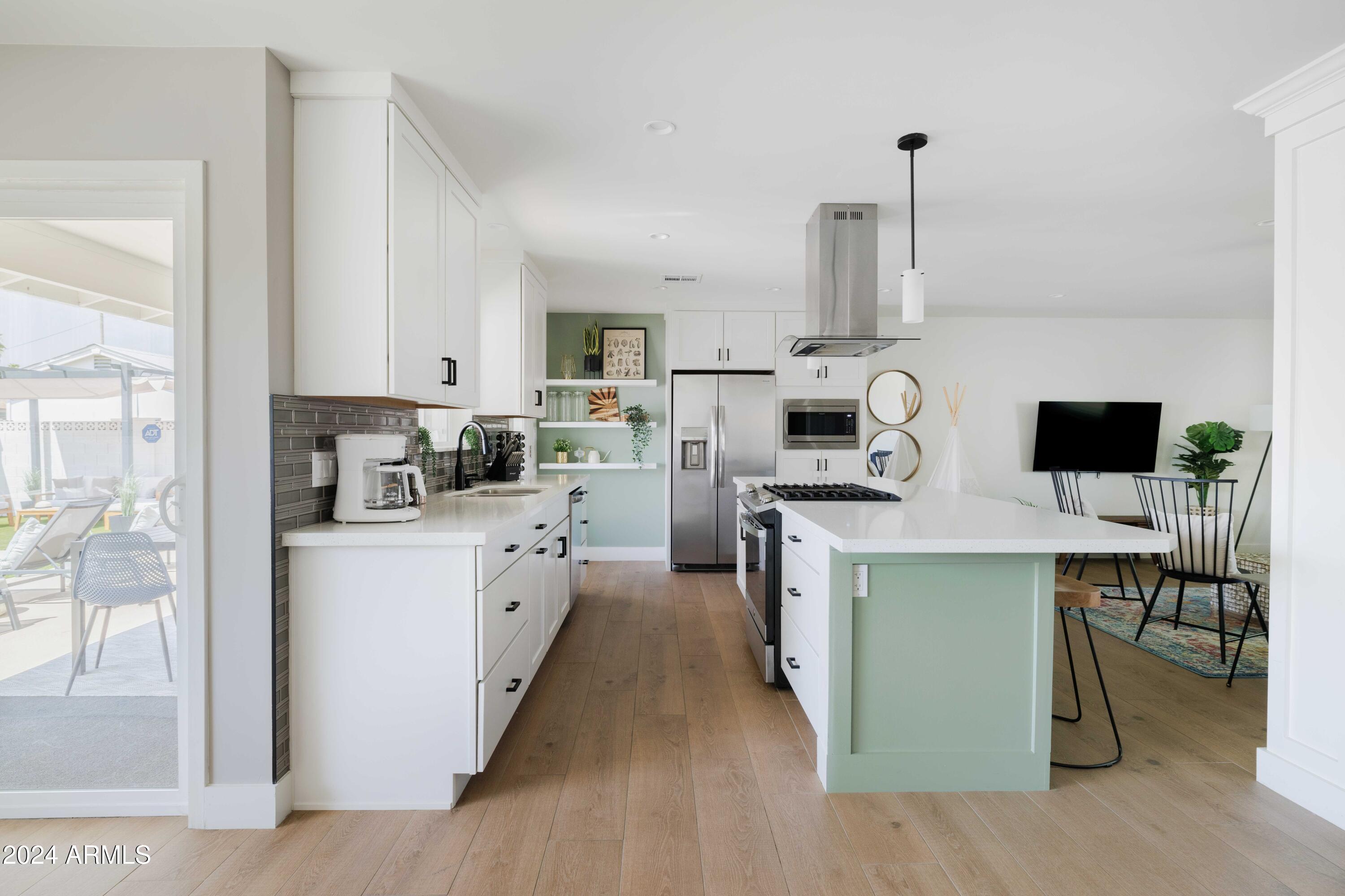 7025 E BELLEVIEW Street