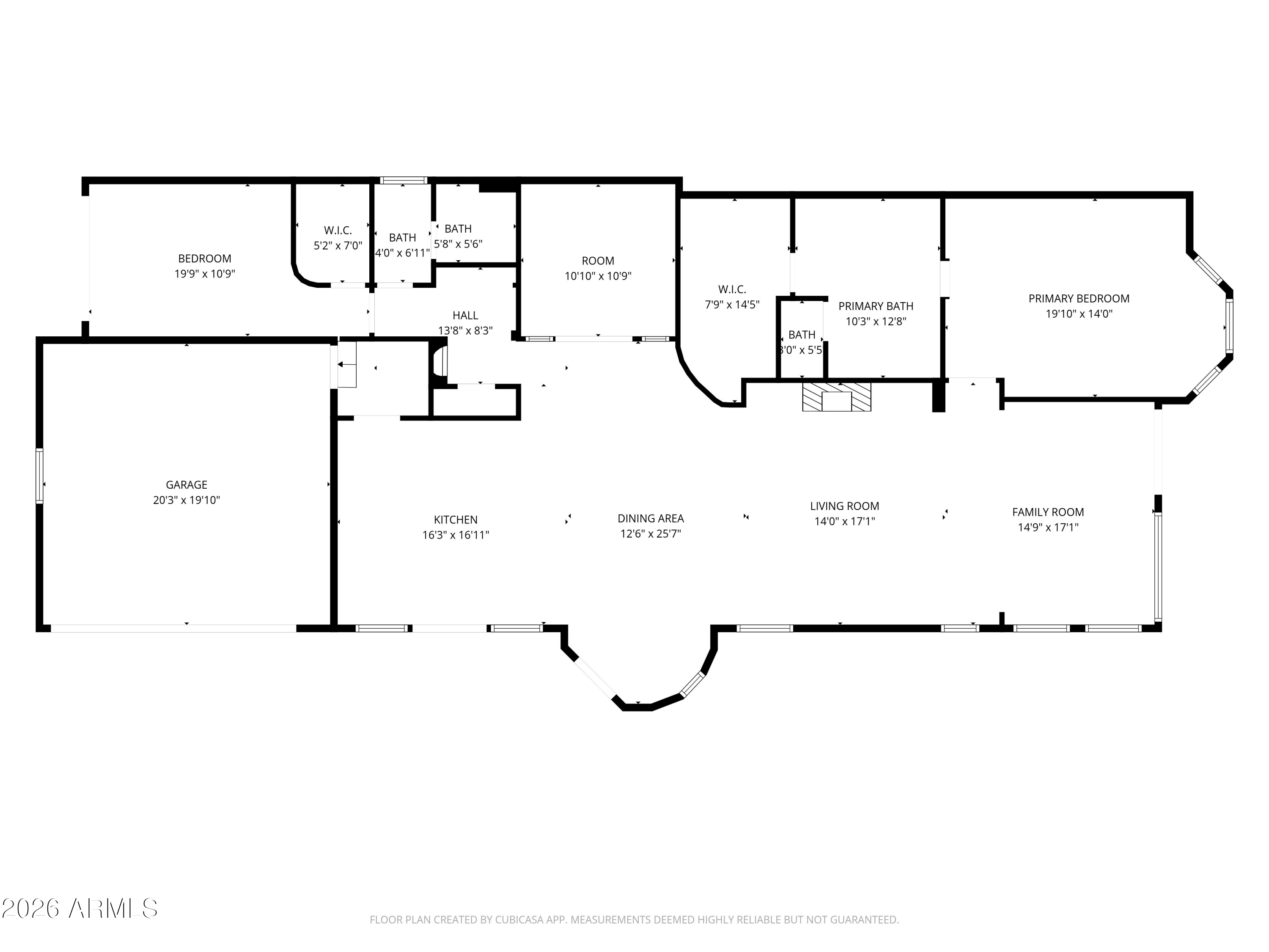 Floor plan showing a garage, open living and dining areas, kitchen, two bedrooms, and multiple bathrooms.