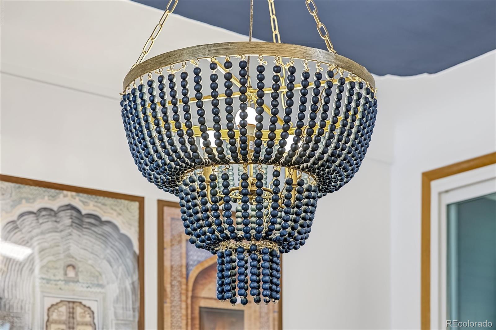 Beaded chandelier with dark blue-black beads and gold-tone metalwork