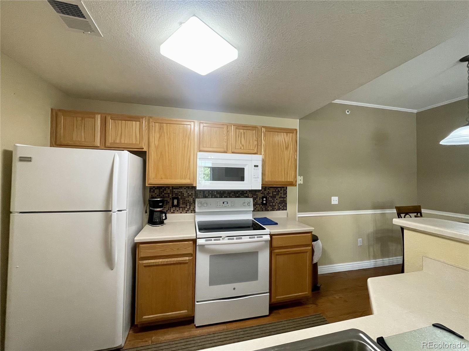 7440 S Blackhawk Street Unit: 205