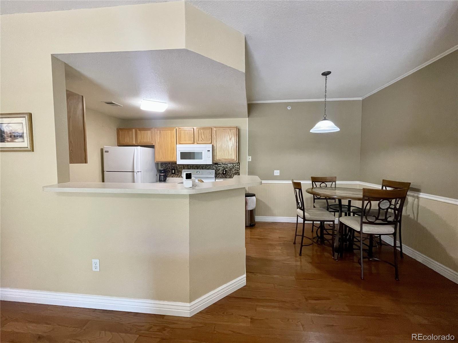 7440 S Blackhawk Street Unit: 205