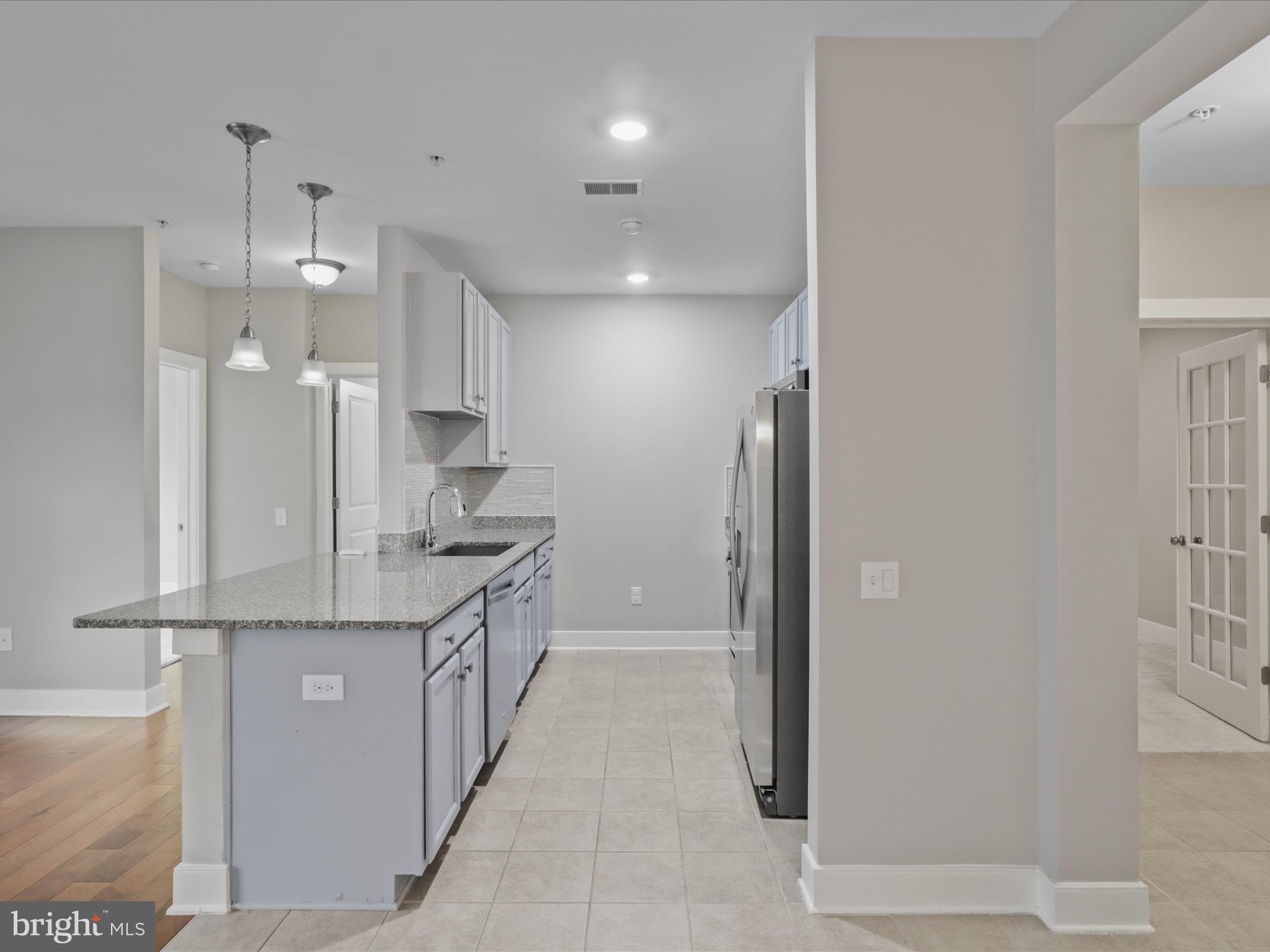 9521 BASTILLE STREET 207