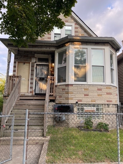 6619 S Peoria Street Unit: 1