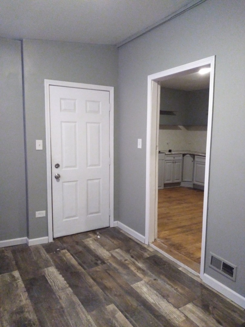 6619 S Peoria Street Unit: 1