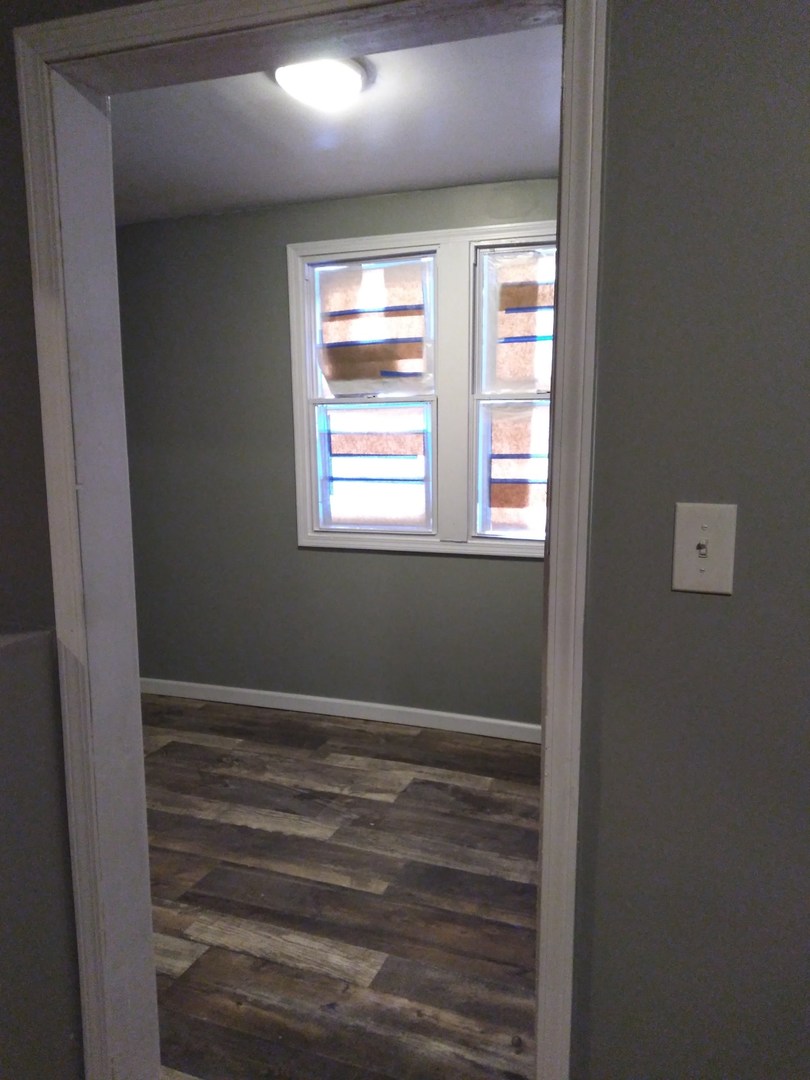 6619 S Peoria Street Unit: 1