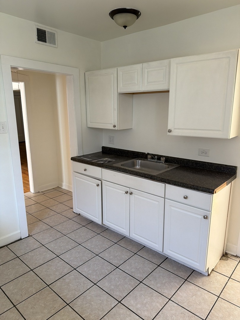 7741 S Yates Boulevard Unit: 3
