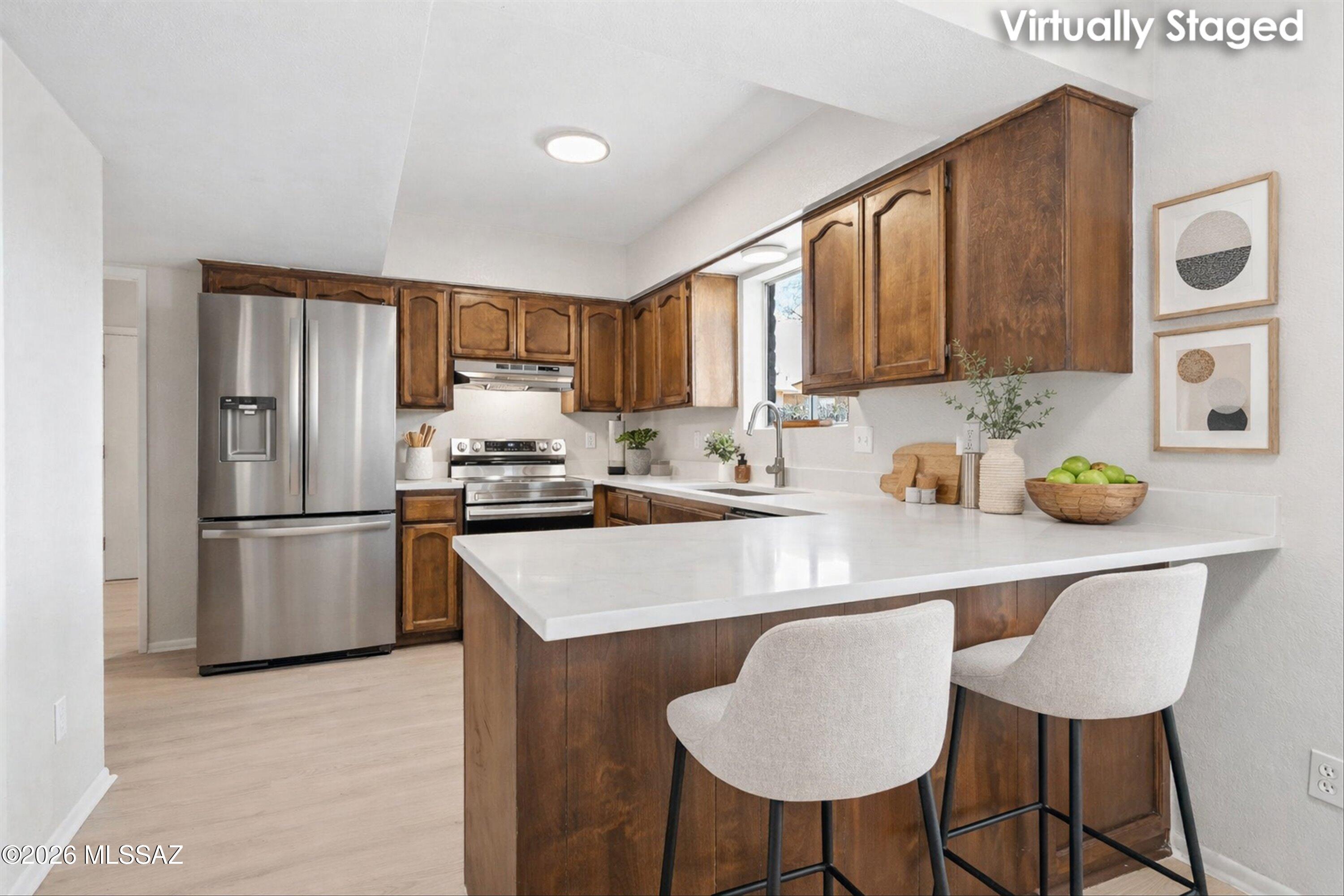 9422 E Barrudean Hills Street