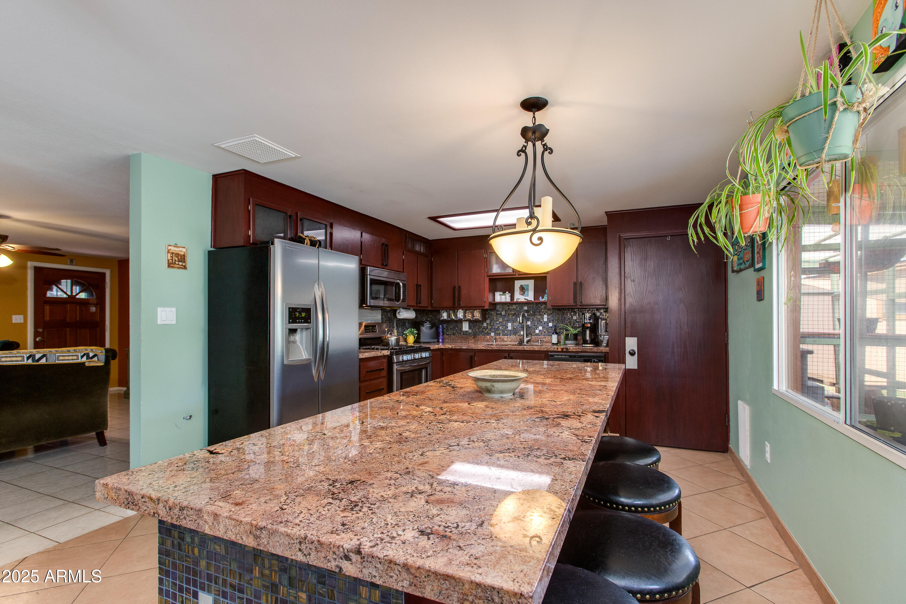 1326 W JOAN DE ARC Avenue