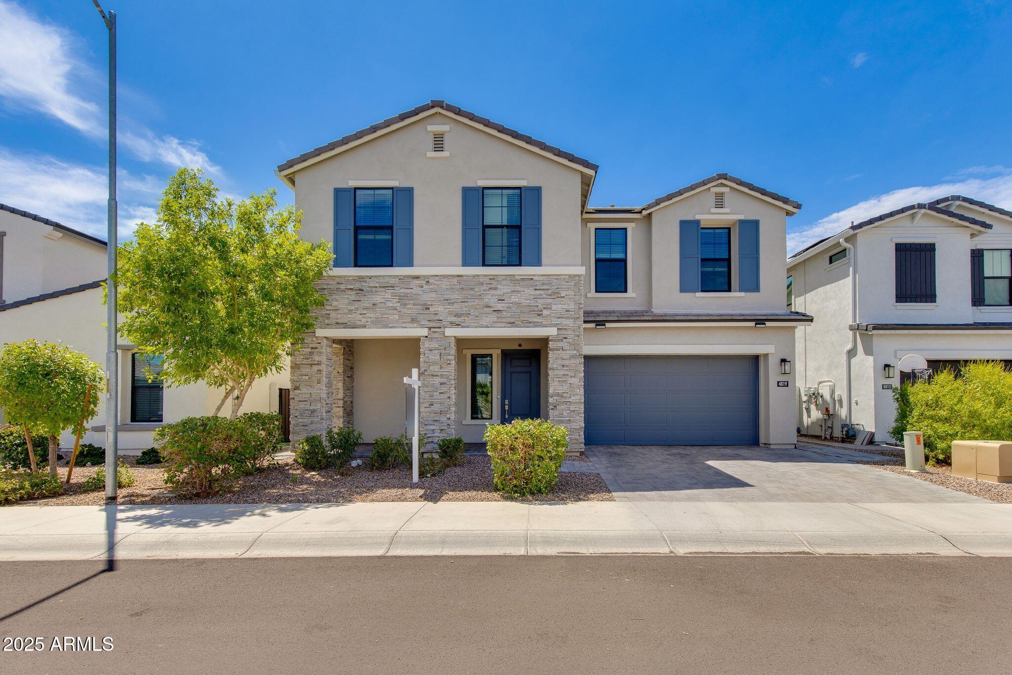 4819 E PADDOCK Place