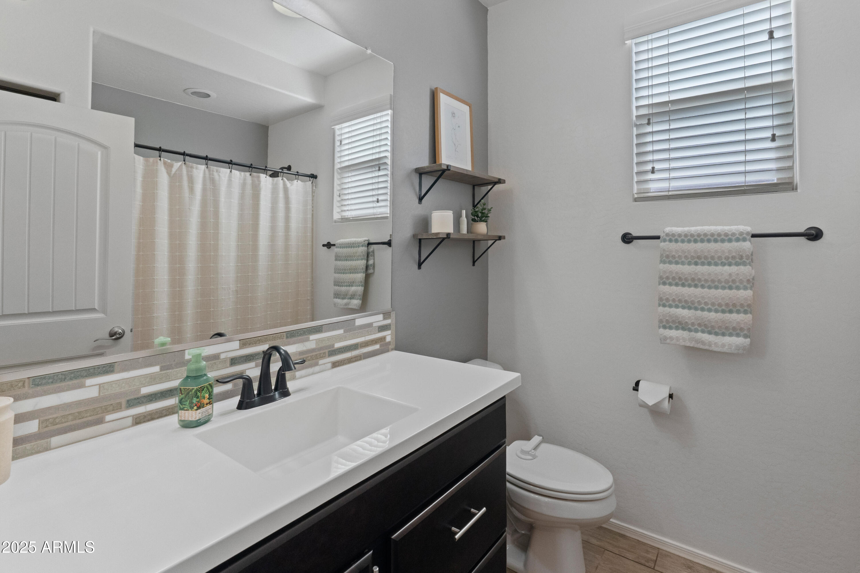 12764 W CARAVEO Place