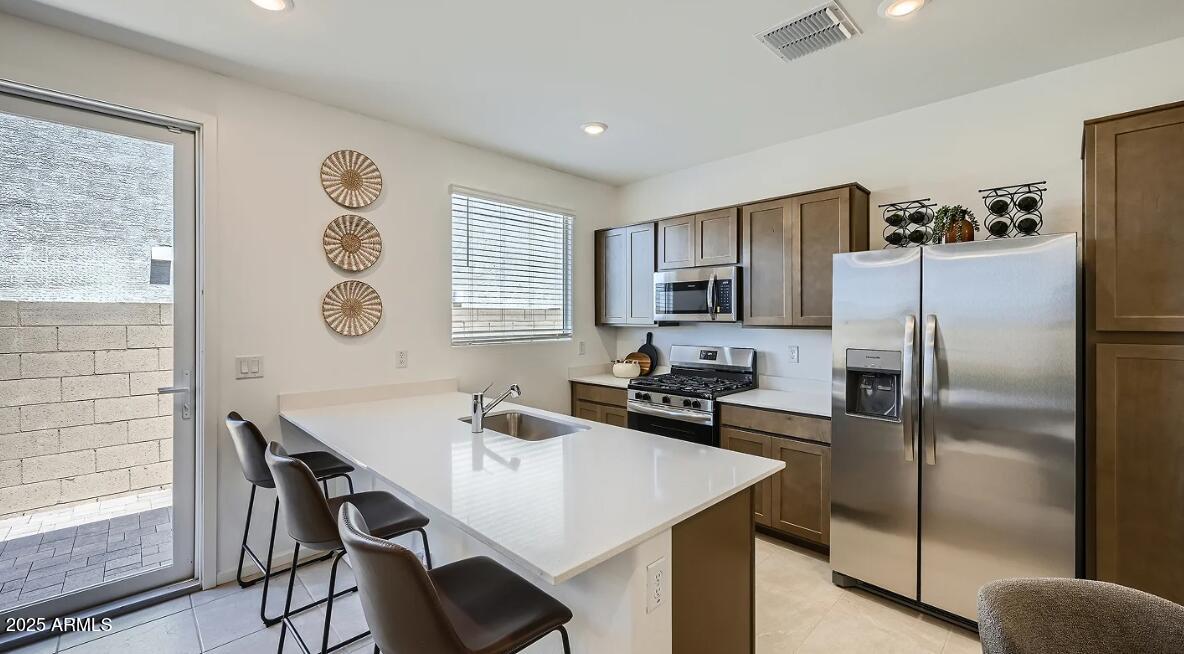 9533 W FLOWER Street